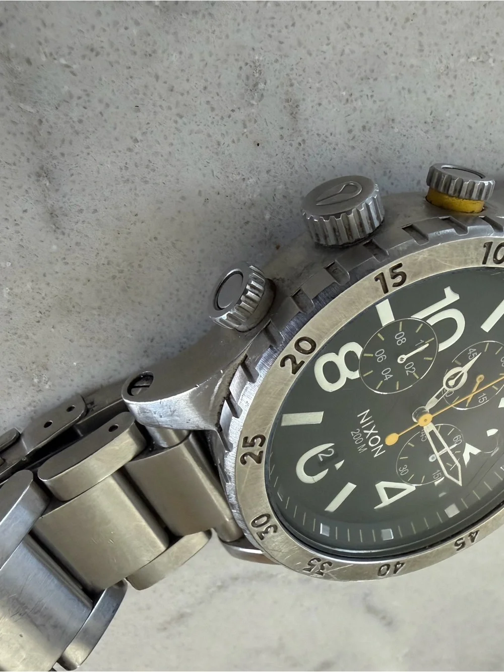 Nixon Stainless Steel Chronograph Watch — Black Dial with Yellow Accents